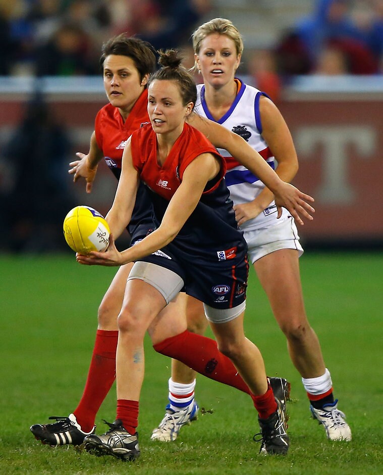 AFL 2013 Media - Womens Exhibition Match Melbourne Demons and Western Bulldogs players in action during the Women's Exhibition match between the Melbourne Demons and Western Bulldogs at the MCG on June 30, 2013. (Photo: Sean Garnsworthy/AFL Media)